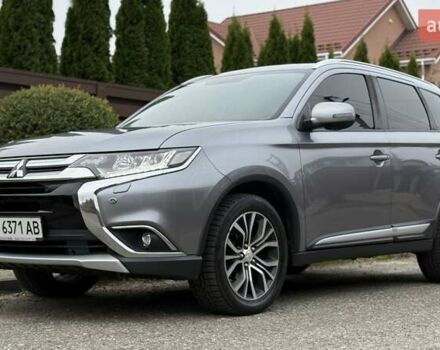 Серый Мицубиси Аутлендер, объемом двигателя 2.36 л и пробегом 153 тыс. км за 16950 $, фото 1 на Automoto.ua