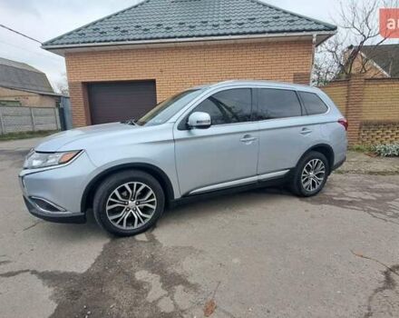 Серый Мицубиси Аутлендер, объемом двигателя 2.36 л и пробегом 120 тыс. км за 16100 $, фото 2 на Automoto.ua