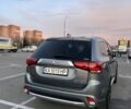 Серый Мицубиси Аутлендер, объемом двигателя 2 л и пробегом 210 тыс. км за 21000 $, фото 2 на Automoto.ua