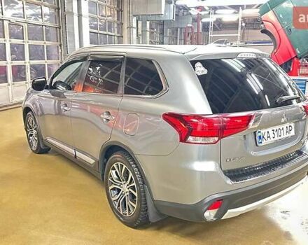 Серый Мицубиси Аутлендер, объемом двигателя 3 л и пробегом 130 тыс. км за 16750 $, фото 2 на Automoto.ua