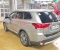 Серый Мицубиси Аутлендер, объемом двигателя 3 л и пробегом 130 тыс. км за 16750 $, фото 2 на Automoto.ua