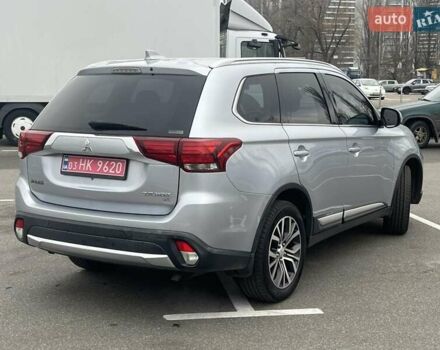 Серый Мицубиси Аутлендер, объемом двигателя 2.36 л и пробегом 120 тыс. км за 16100 $, фото 3 на Automoto.ua