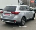 Серый Мицубиси Аутлендер, объемом двигателя 2.36 л и пробегом 120 тыс. км за 16100 $, фото 3 на Automoto.ua