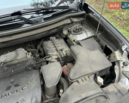 Серый Мицубиси Аутлендер, объемом двигателя 2.4 л и пробегом 189 тыс. км за 16950 $, фото 142 на Automoto.ua