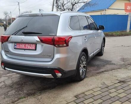 Серый Мицубиси Аутлендер, объемом двигателя 2.36 л и пробегом 120 тыс. км за 16100 $, фото 6 на Automoto.ua