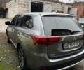 Сірий Міцубісі Аутлендер, об'ємом двигуна 2.36 л та пробігом 162 тис. км за 12300 $, фото 3 на Automoto.ua