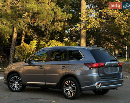 Серый Мицубиси Аутлендер, объемом двигателя 2.4 л и пробегом 167 тыс. км за 15999 $, фото 3 на Automoto.ua