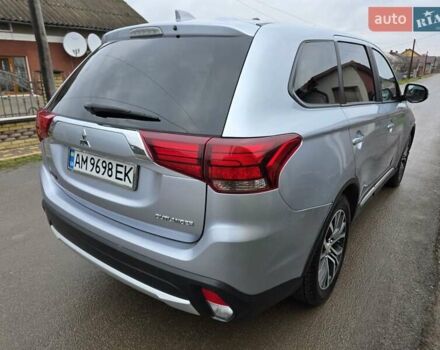 Серый Мицубиси Аутлендер, объемом двигателя 2.36 л и пробегом 170 тыс. км за 13800 $, фото 9 на Automoto.ua