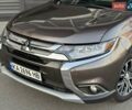 Серый Мицубиси Аутлендер, объемом двигателя 2.36 л и пробегом 145 тыс. км за 17500 $, фото 3 на Automoto.ua
