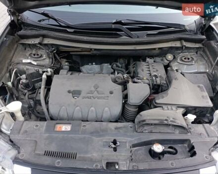 Серый Мицубиси Аутлендер, объемом двигателя 2.4 л и пробегом 87 тыс. км за 16500 $, фото 21 на Automoto.ua