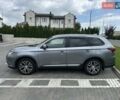 Сірий Міцубісі Аутлендер, об'ємом двигуна 2.4 л та пробігом 185 тис. км за 14300 $, фото 1 на Automoto.ua