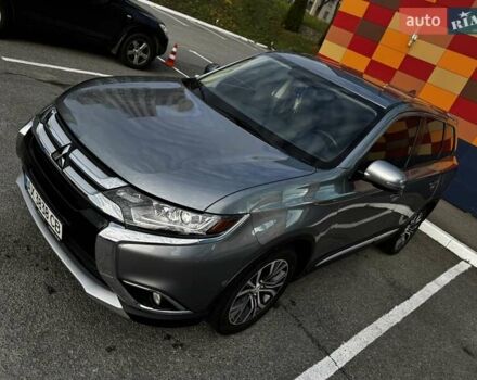 Серый Мицубиси Аутлендер, объемом двигателя 2.36 л и пробегом 51 тыс. км за 21000 $, фото 2 на Automoto.ua