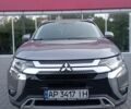 Серый Мицубиси Аутлендер, объемом двигателя 2.4 л и пробегом 87 тыс. км за 16500 $, фото 2 на Automoto.ua