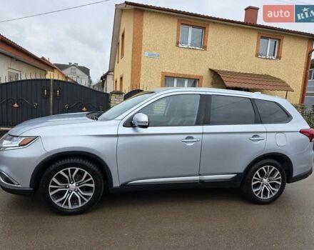 Серый Мицубиси Аутлендер, объемом двигателя 2.36 л и пробегом 170 тыс. км за 13800 $, фото 3 на Automoto.ua