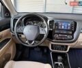Серый Мицубиси Аутлендер, объемом двигателя 2.36 л и пробегом 145 тыс. км за 17500 $, фото 31 на Automoto.ua