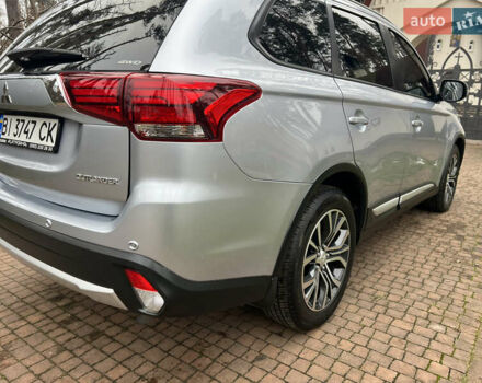 Серый Мицубиси Аутлендер, объемом двигателя 2.4 л и пробегом 189 тыс. км за 16950 $, фото 25 на Automoto.ua