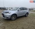 Серый Мицубиси Аутлендер, объемом двигателя 2.3 л и пробегом 205 тыс. км за 15999 $, фото 1 на Automoto.ua