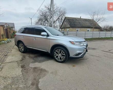 Серый Мицубиси Аутлендер, объемом двигателя 2.36 л и пробегом 120 тыс. км за 16100 $, фото 4 на Automoto.ua