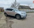 Серый Мицубиси Аутлендер, объемом двигателя 2.36 л и пробегом 120 тыс. км за 16100 $, фото 4 на Automoto.ua
