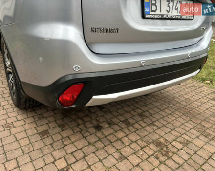 Серый Мицубиси Аутлендер, объемом двигателя 2.4 л и пробегом 189 тыс. км за 16950 $, фото 132 на Automoto.ua