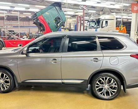 Серый Мицубиси Аутлендер, объемом двигателя 3 л и пробегом 130 тыс. км за 16750 $, фото 1 на Automoto.ua