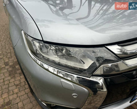 Серый Мицубиси Аутлендер, объемом двигателя 2.4 л и пробегом 189 тыс. км за 16950 $, фото 124 на Automoto.ua