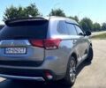 Серый Мицубиси Аутлендер, объемом двигателя 2.36 л и пробегом 109 тыс. км за 15500 $, фото 1 на Automoto.ua