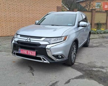 Серый Мицубиси Аутлендер, объемом двигателя 2.36 л и пробегом 120 тыс. км за 16100 $, фото 1 на Automoto.ua