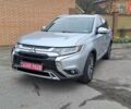 Серый Мицубиси Аутлендер, объемом двигателя 2.36 л и пробегом 120 тыс. км за 16100 $, фото 1 на Automoto.ua