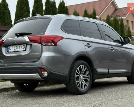 Серый Мицубиси Аутлендер, объемом двигателя 2.36 л и пробегом 153 тыс. км за 16950 $, фото 2 на Automoto.ua