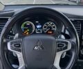 Серый Мицубиси Аутлендер, объемом двигателя 2 л и пробегом 210 тыс. км за 21000 $, фото 4 на Automoto.ua