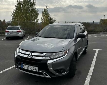 Сірий Міцубісі Аутлендер, об'ємом двигуна 2.36 л та пробігом 135 тис. км за 15000 $, фото 2 на Automoto.ua