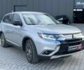 Серый Мицубиси Аутлендер, объемом двигателя 2.4 л и пробегом 183 тыс. км за 16590 $, фото 2 на Automoto.ua