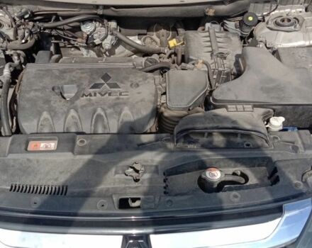 Серый Мицубиси Аутлендер, объемом двигателя 2.4 л и пробегом 100 тыс. км за 17700 $, фото 6 на Automoto.ua