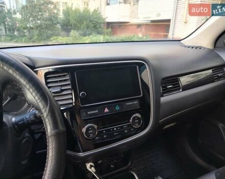 Сірий Міцубісі Аутлендер, об'ємом двигуна 2.4 л та пробігом 95 тис. км за 16800 $, фото 6 на Automoto.ua