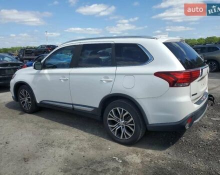 Серый Мицубиси Аутлендер, объемом двигателя 2.36 л и пробегом 107 тыс. км за 3000 $, фото 1 на Automoto.ua