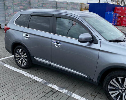 Серый Мицубиси Аутлендер, объемом двигателя 2.36 л и пробегом 160 тыс. км за 18300 $, фото 1 на Automoto.ua