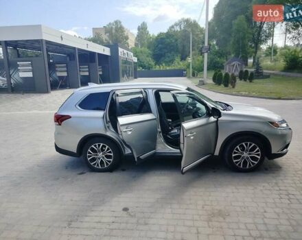 Серый Мицубиси Аутлендер, объемом двигателя 2.36 л и пробегом 95 тыс. км за 15999 $, фото 1 на Automoto.ua