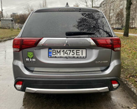 Серый Мицубиси Аутлендер, объемом двигателя 2.36 л и пробегом 150 тыс. км за 13500 $, фото 5 на Automoto.ua