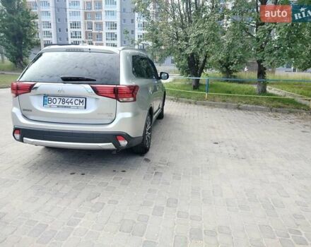 Серый Мицубиси Аутлендер, объемом двигателя 2.36 л и пробегом 95 тыс. км за 15999 $, фото 3 на Automoto.ua