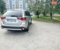 Серый Мицубиси Аутлендер, объемом двигателя 2.36 л и пробегом 95 тыс. км за 15999 $, фото 3 на Automoto.ua