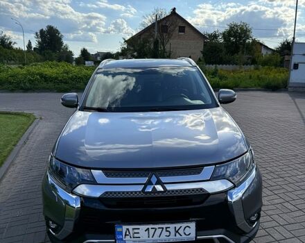 Серый Мицубиси Аутлендер, объемом двигателя 2.4 л и пробегом 139 тыс. км за 18900 $, фото 1 на Automoto.ua
