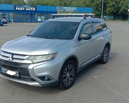 Серый Мицубиси Аутлендер, объемом двигателя 2.4 л и пробегом 100 тыс. км за 17700 $, фото 1 на Automoto.ua
