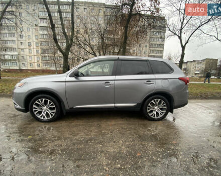 Серый Мицубиси Аутлендер, объемом двигателя 2.36 л и пробегом 150 тыс. км за 13500 $, фото 3 на Automoto.ua