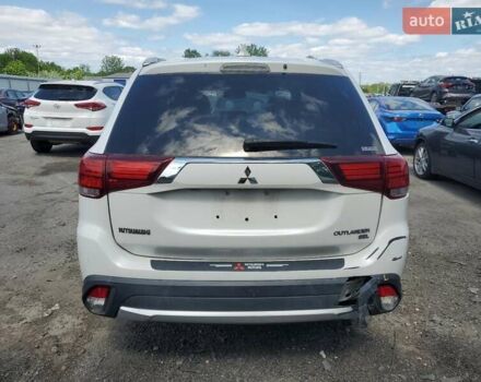 Серый Мицубиси Аутлендер, объемом двигателя 2.36 л и пробегом 107 тыс. км за 3000 $, фото 5 на Automoto.ua