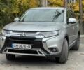 Серый Мицубиси Аутлендер, объемом двигателя 2.4 л и пробегом 110 тыс. км за 15950 $, фото 1 на Automoto.ua