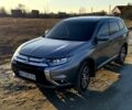 Серый Мицубиси Аутлендер, объемом двигателя 2.4 л и пробегом 125 тыс. км за 17200 $, фото 1 на Automoto.ua