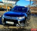 Серый Мицубиси Аутлендер, объемом двигателя 2.4 л и пробегом 95 тыс. км за 17500 $, фото 1 на Automoto.ua