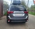 Серый Мицубиси Аутлендер, объемом двигателя 2.4 л и пробегом 170 тыс. км за 13999 $, фото 5 на Automoto.ua