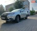 Сірий Міцубісі Аутлендер, об'ємом двигуна 2.4 л та пробігом 95 тис. км за 16800 $, фото 1 на Automoto.ua